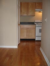 hardwood floors in foyer & kitchen