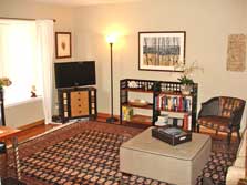 living room w/bay window & hardwood floors